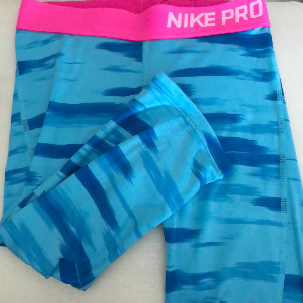 Blue and pink Nike Capri spandex leggings